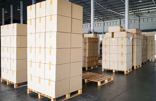 Interior of warehouse with stack package boxes on pallets, Warehouse industry delivery shipment goods, Logistics and transport